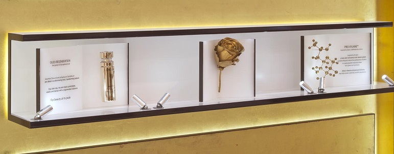 L'Oreal display of gold metallised molecular model